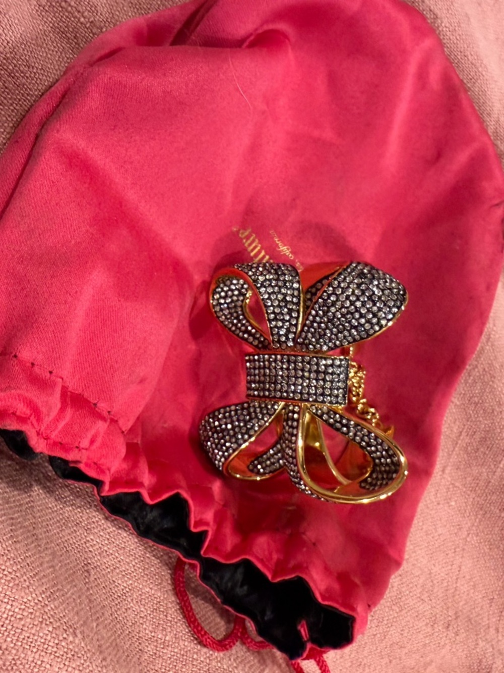 Fun Juicy Couture vintage chunky bow bracelet.